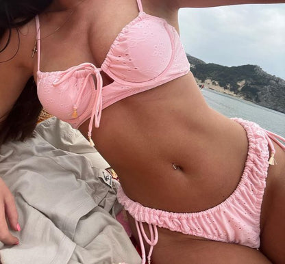 Dolly Pink Broderie Anglaise Textured Bikini Bottom on gorgeous model - close up on beach