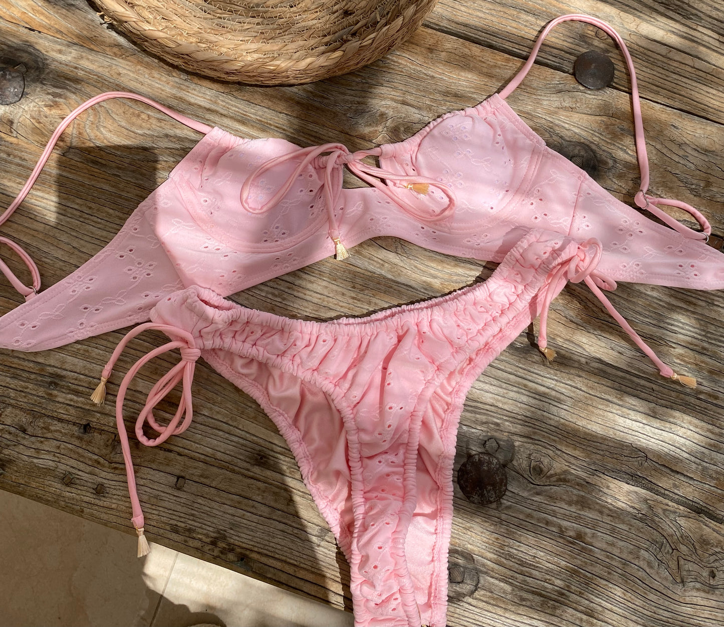 Dolly Pink Broderie Anglaise Textured Padded Bikini Top on our gorgeous model - flat lay