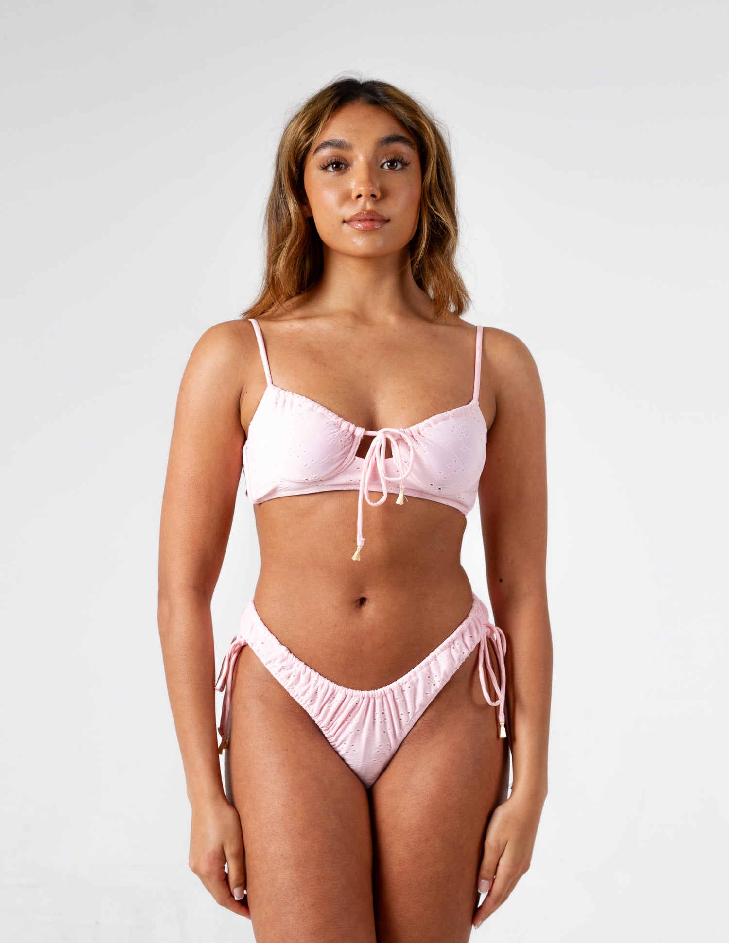 Dolly Pink Broderie Anglaise Textured Bikini Top on our gorgeous model - front